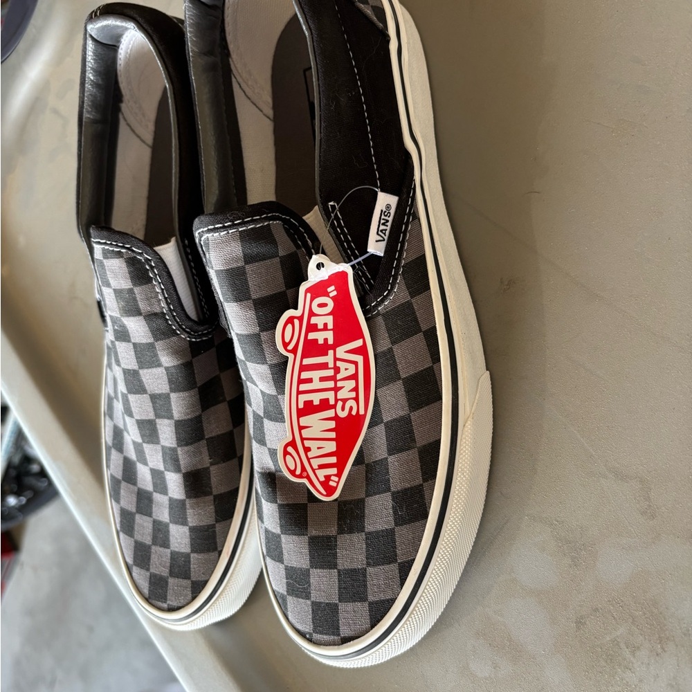Vans Black and White Slip-On Shoes